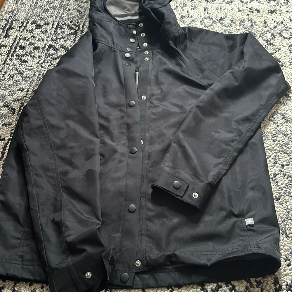 Figs women size small raincoat , slightly used